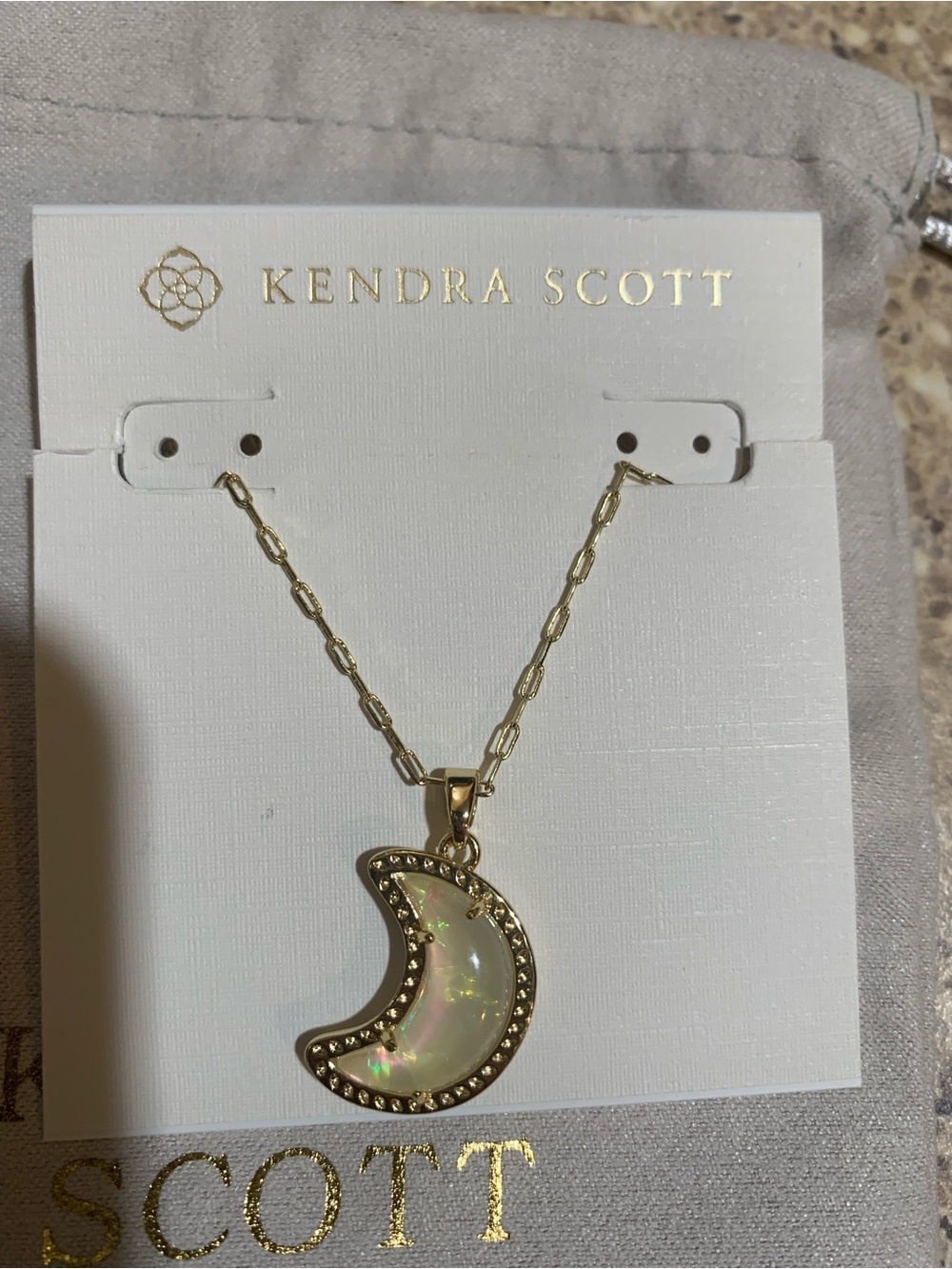 Kendra Scott Gold Crescent Moon Necklace with Opalescent White Center